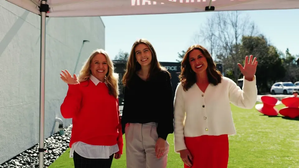 Three Valley Christian Schools leaders waving at an open house