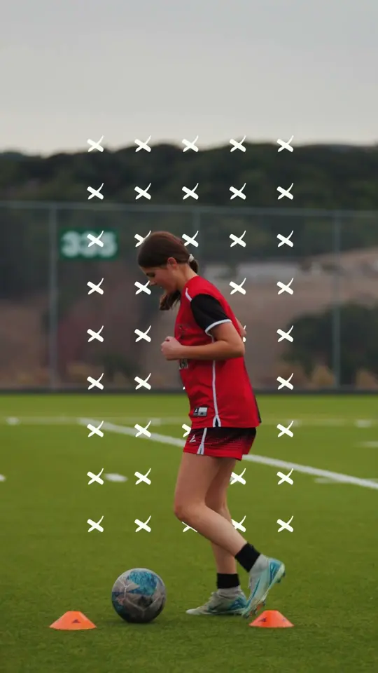 A student athlete running a soccer drill